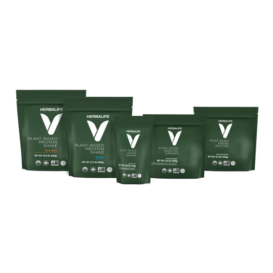 Herbalife Vegan Plant-Based products including protein shake and supplements in green packaging.